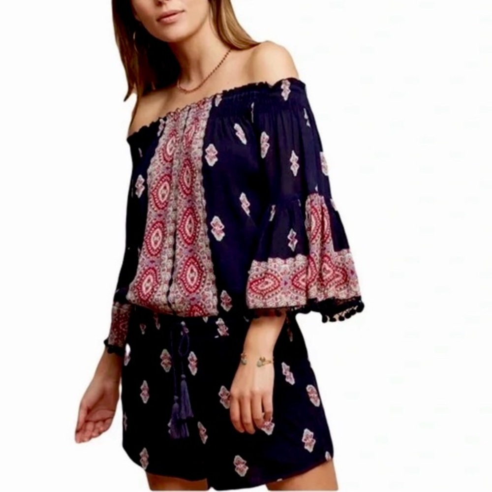 Anthropologie Lilka Vada off-the-shoulder romper with pom-pom trimmed sleeves